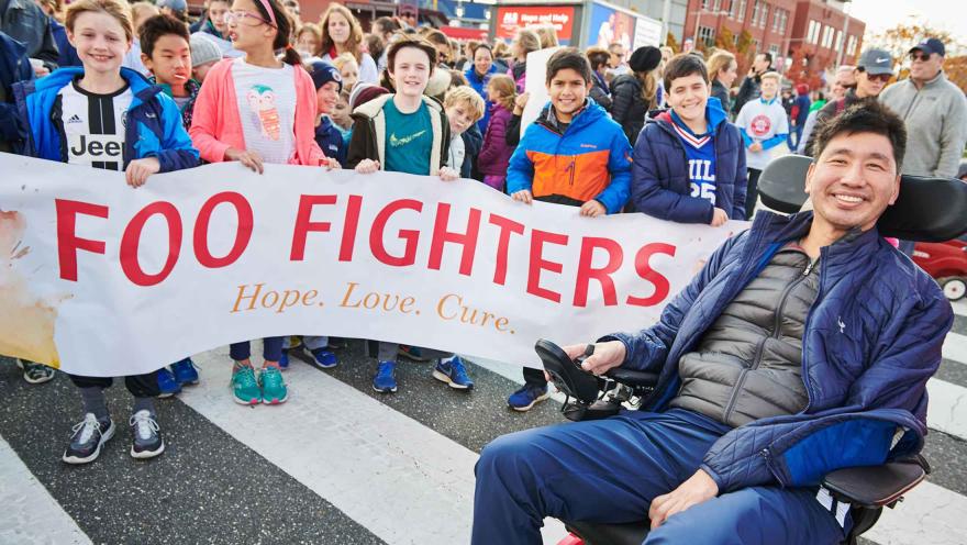 Person in wheelchair attending a Walk to Defeat ALS event